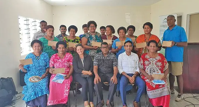 The Minister for Environment, Mahendra Reddy (front row, fourth from left) with the Director Environment, Sandeep Singh (front row, third from left), the Permanent Secretary for Environment, Joshua Wycliffe (front row, second from right) with the 17 recipients after the handover of the cheques at Nailaga, Ba on April 12, 2022. Photo: Nicolette Chambers 