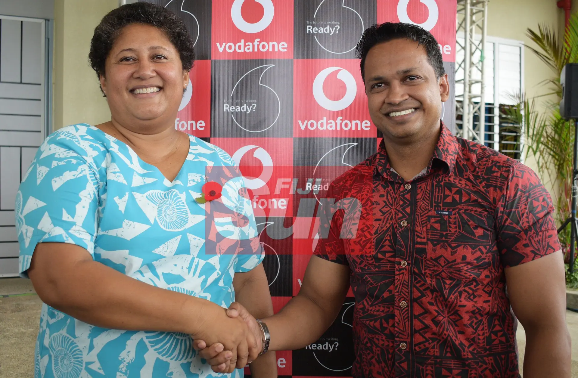 Fiji Sports Council Chief Executive Officer, Litiana Loabuka (left) with Vodafone Chief Marketing Officer Rajnesh Prasad after signing three year naming right of Vodafone Arena on November 8, 2019. Photo: Ronald Kumar.