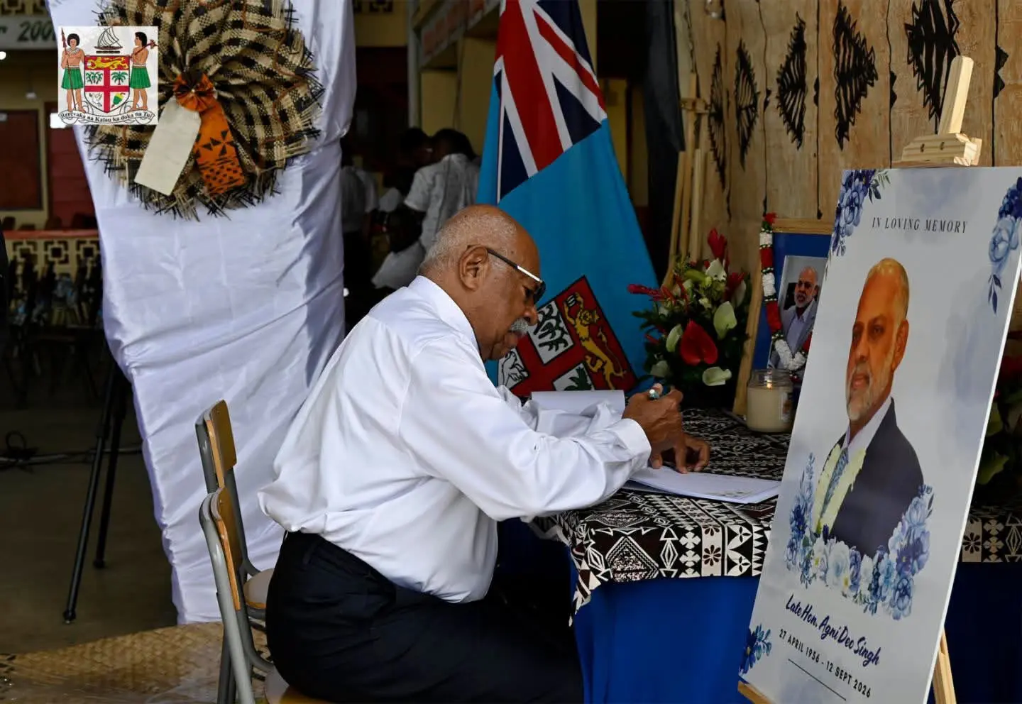 Prime Minister Sitiveni Rabuka signs the condolence book at Mr Agni Deo Singh's funeral service in Nasinu on September 20, 2026.