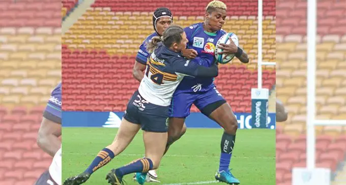 Rooster Chicken Fijiana Drua centre Roela Radiniyavuni (with ball) tries to escape a Brumbies player during their Round 5 match at Suncorp Stadium, Brisbane, Australia, on April 9, 2022. Photo: FRU Media