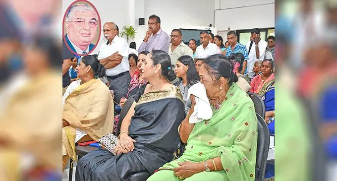 Friends and relatives during the funeral service of the late Diwan Chand Maharaj at the Dignified Crematorium on November 20, 2024. Photo: Office of the Prime Minister  INSET: The late Diwan Chand Maharaj.