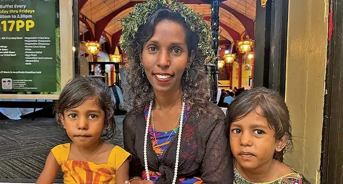 Lily Sesario with her twin daughters Vaseva Lily and Lydia Priscilla. Photo: Nolishma Narayan