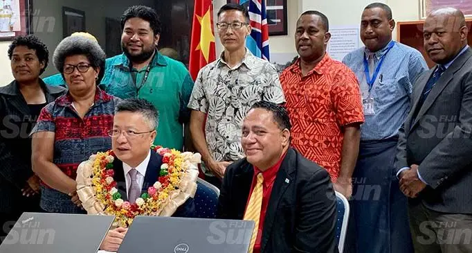 Sitting from left: Chinese Ambassador to Fiji Qian Bo, National Archives of Fiji director, Collin Yabaki with staff members of the National Archives and the Chinese Embassy during the handover on September 17, 2020. Photo: Fonua Talei