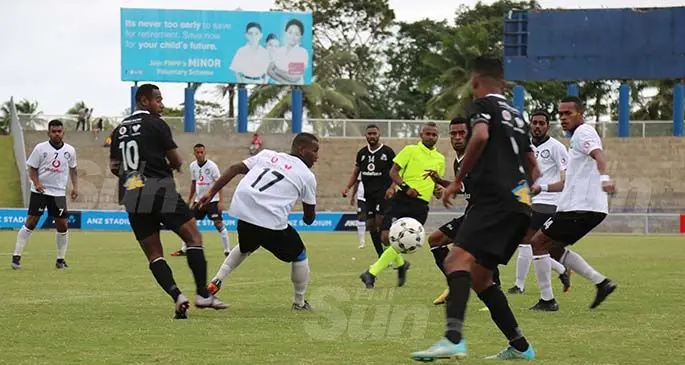 Suva midfielder Filipe Baravilala (17) battles Ba defenders during the Vodafone Premier League clash at the ANZ Stadium, Suva, on September 6, 2020. Suva won 2-1 and claimed second spot in the VPL points table. They are now behind Rewa by just two points. Ba dropped to third spot. Photo: JENNIS NAIDU
