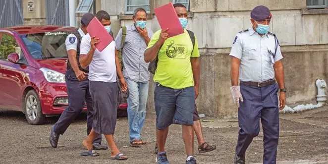 Gauna Bera Halofaki (front-right), Pauliasi Davetawalu (back), 41, Joji Vuli (second from left ), 29, have been fined $250 each by the Suva Magistrate Court on April 29, 2021, after they pleaded guilty to social gathering for the purposes of drinking alcohol. Photo: Leon Lord.