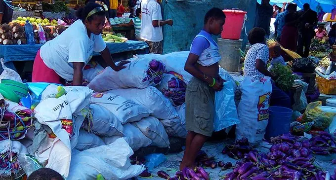 An increase in the minimum wage rate will not benefit people like market vendors. Instead they will be  disadvantaged by an increase in the prices of goods and services. 