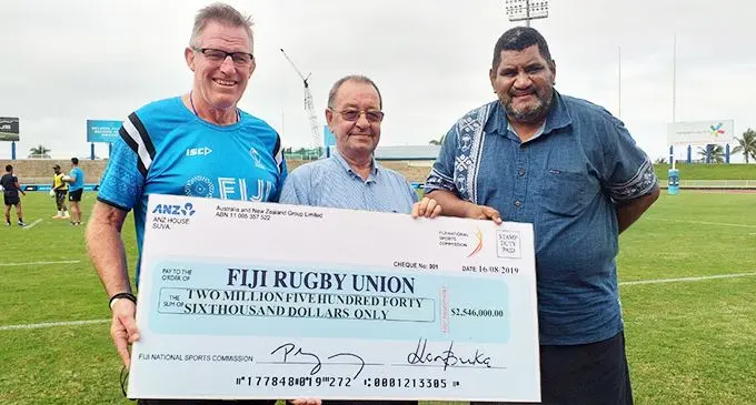 From left: Fiji Airways Flying Fijians head coach John McKee, Fiji National Sports Commission executive chairman Peter Mazey and Fiji Rugby Union chief executive officer John O’Connor during the cheque handover at Suva’s ANZ Stadium on August 22, 2019. Photo: Sheldon Chanel