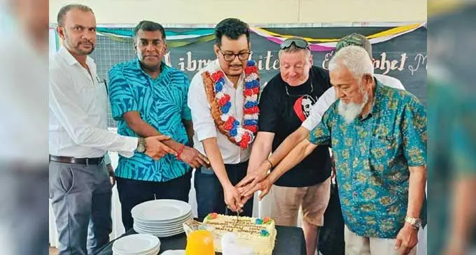 Al Hamd managing director Ashfaaq Khan (with garland), Andrew’s Primary School president Mohammed Sattar ( with beard), school staff and visitors during Prophet Muhammed Birthday celebrations on September 13. Photo: Supplied