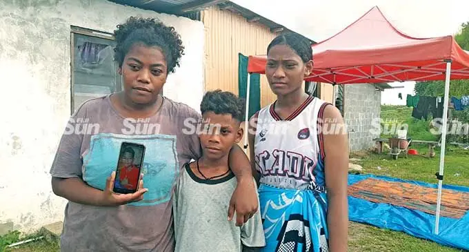 From left: Tokasa Serau, with youngest brother Waisea Coka and sister Temalesi at Nasau in Nadi.  Photo: Mereleki Nai
