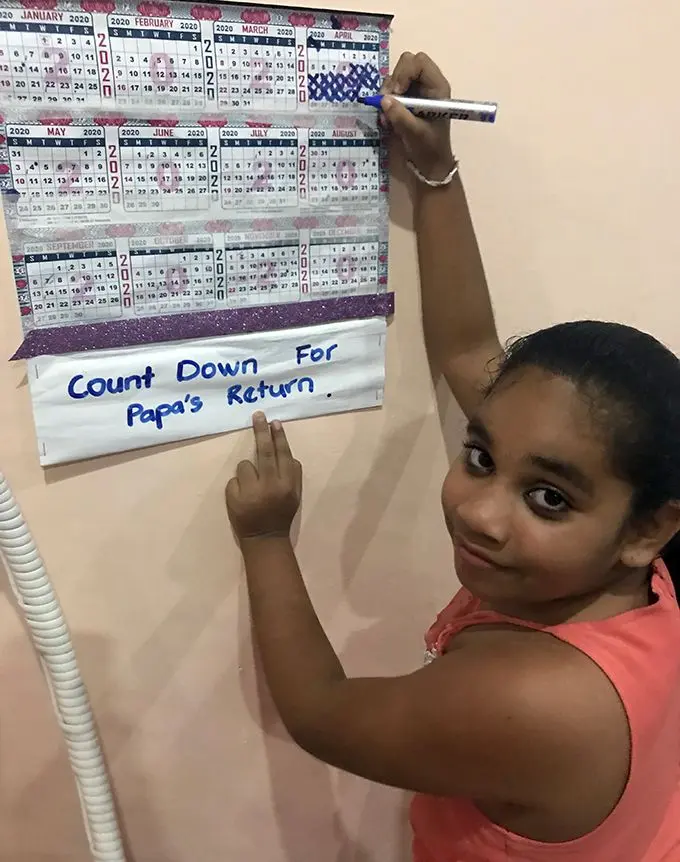 Seven-year-old Michelle Kumar wrote a letter to her father (pictured left, working on the frontline of the COVID-19 crisis. He is a nurse, dealing with COVID-19 patients at the Labasa Hospital) asking him to be safe and return home to her soon. Michelle has also been marking the days on her calendar until her father is able to return home. Photos: Shratika Naidu