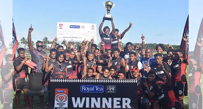 Navosa rugby players, officials and supporters hoist the Royal Tea Ranadi Cup at Lawaqa Park, Sigatoka, on July 15, 2022. Photo: Waisea Nasokia       