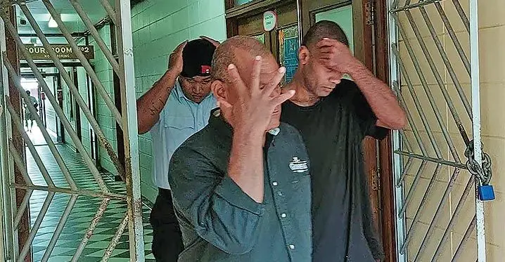 Maika Bavou (left) is escorted out of the High Court in Lautoka on March 6, 2023. Photo: Salote Qalubau