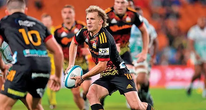 Chiefs playmaker Damian McKenzie leads his team’s attack against the Drua at Waikato Stadium. Photo: Photosport