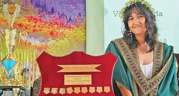 Zara Cama-Dean with her achievement during Year 13 graduation at Swami Vivekananda College in Nadi.
