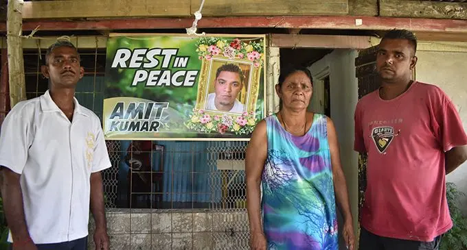 From left: Nilesh Kumar, mother Phul Mati and Avinesh Kumar at their home in Solovi, Nadi.  Photo: Mereleki Nai