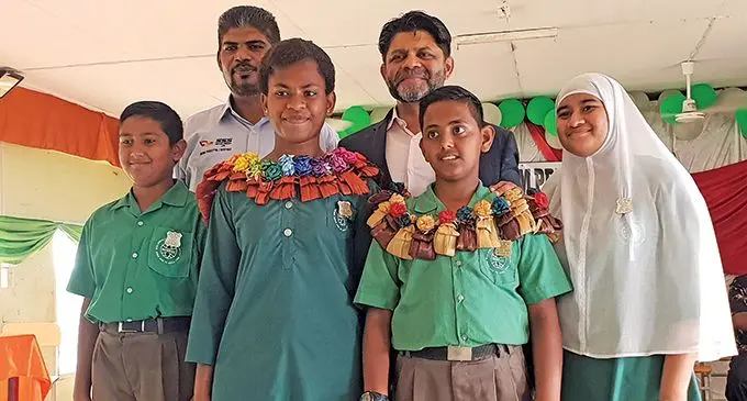 From left: Mulomulo Muslim Primary School deputy Head Boy Fawwaz Mohammed, head teacher Mohammed Nazim, Head Girl Kelera Naudu, Attorney-General and Minister for Economy, Aiyaz Sayed-Khaiyum, Head Boy, Rehaan Sheikh and deputy Head Girl Alia Khan on May 16, 2022. Photo: Nicolette Chambers  