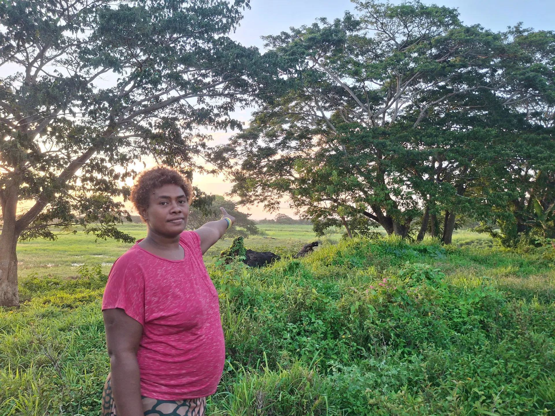 Margaret Agnes pointing to the field where the body was found.
