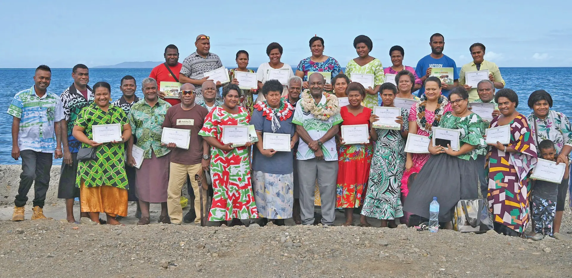Assistant Minister for Agriculture Inosi Kuridrani with farmers and market vendors who completed their Basic Vegetables Production Training in Levuka last week. 