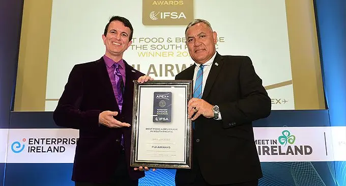 Fiji’s High Commissioner to the United Kingdom, Jitoko Tikolevu, accepting the award from APEX CEO Joe Leader on behalf of Fiji Airways. Photo: Fiji Airways