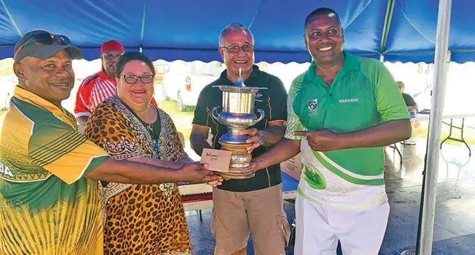 Semesa Naiseruvati (left) and Bobby Prasad (right) with the sponsors during the presentation. Photo: NSSC