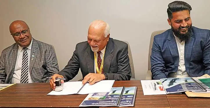 From left: Deputy Prime Minister and Minister for Trade, Cooperatives, Small and Medium Enterprises, and Communications, Manoa Kamikamica with Paradise Lightings PTE Limited Director Raghu Chowdhary and Bazaar Limited Managing Director Lalji Modi during the official signing of the Memorandum of Understanding (MoU) between both companies. Photo: Investment Fiji