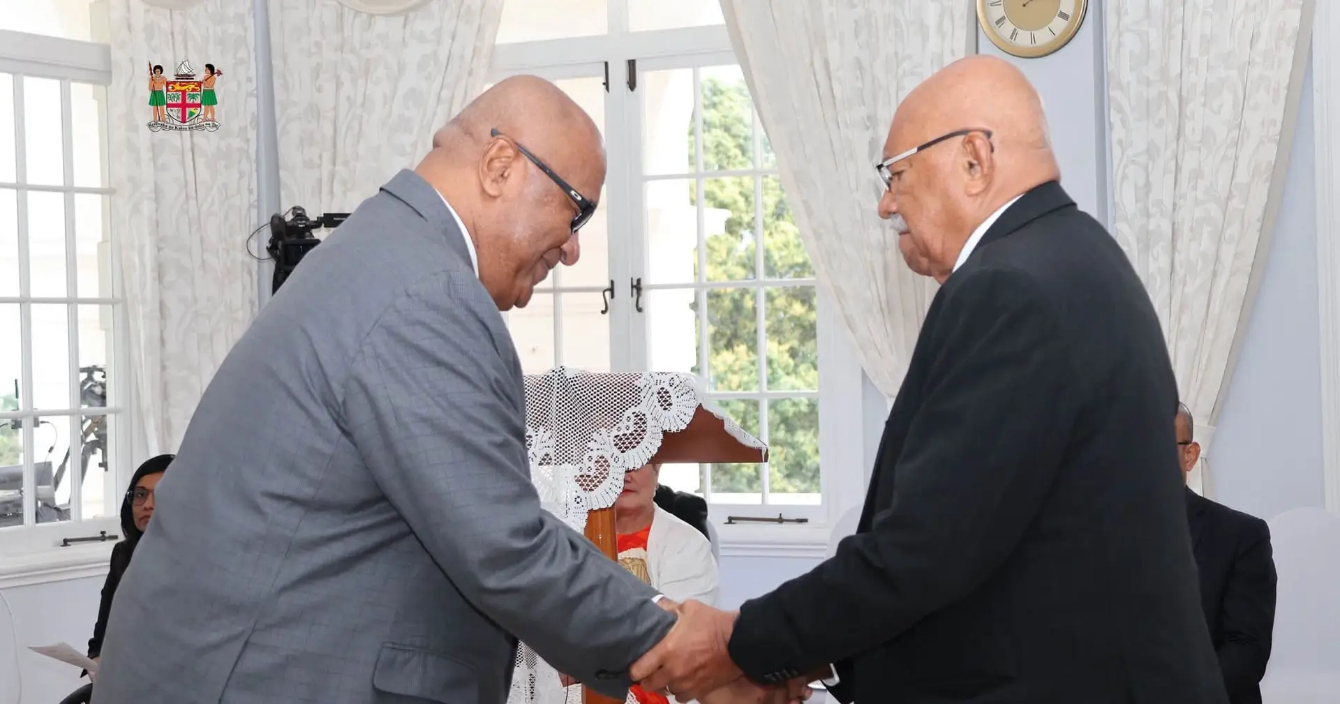 Prime Minister Sitiveni Rabuka congratulates Manoa Kamikamica on his reappointment as deputy Prime Minister.