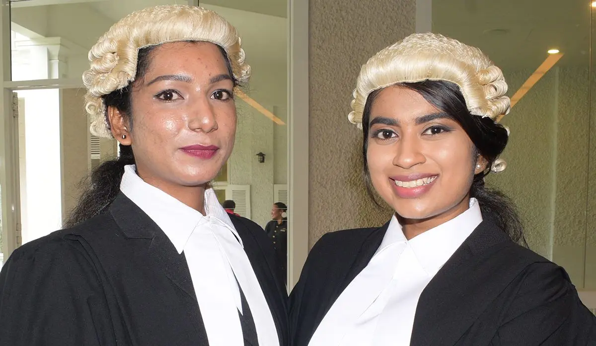 Friends Safia Ahmed (left) and Bhavishna Pillay following their Admission to the Bar by Acting Chief Justice Kamal Kumar at Grand Pacific Hotel on August 16, 2019. Photo: Ronald Kumar.