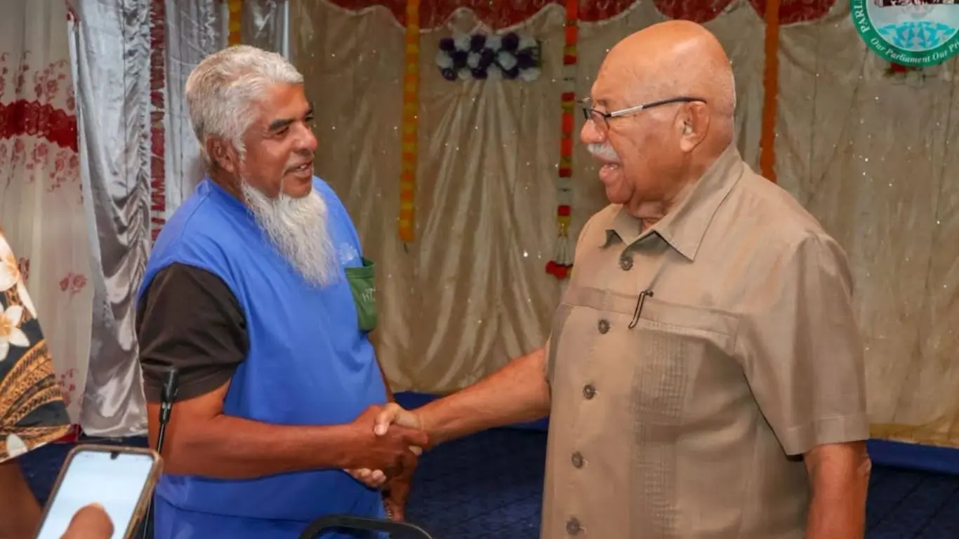 Prime Minister Sitiveni Rabuka (left), and Seaqaqa farmer Aktar Hussain during the consultation at Seaqaqa Sanatan Hall on August 5, 2026.
