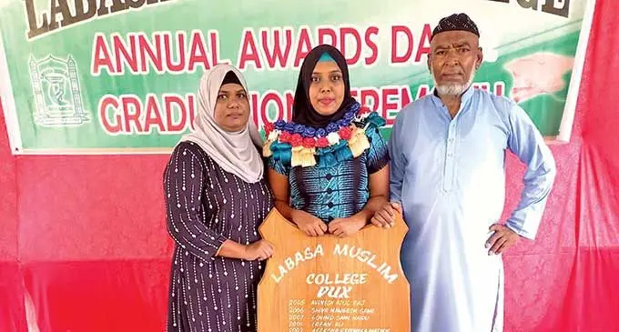 Labasa Muslim College Dux, Asifa Hanif, along with proud parents Mohammed Hanif and Shain Nisha during the annual prize giving ceremony at the school on March 9, 2022. Photo: Sampras Anand
