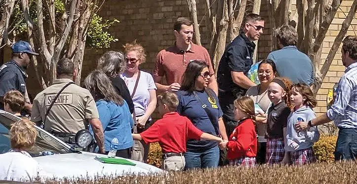 Children arrive at Woodmont Baptist Church to be reunited with their families after a mass shooting at The Covenant School in Nashville. Photo: AFP