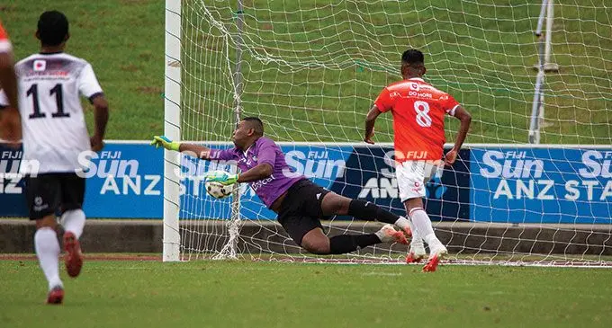Rewa remain on top....Suva goalkeeper Jovilisi Borisi fails to stop Ivan Kumar’s piledriver during their Digicel Premier League clash at the ANZ Stadium on March 20, 2022. They drew 2-2 and Rewa remain at the top spot of the Digicel Premier League points table. Photo: Leon Lord.