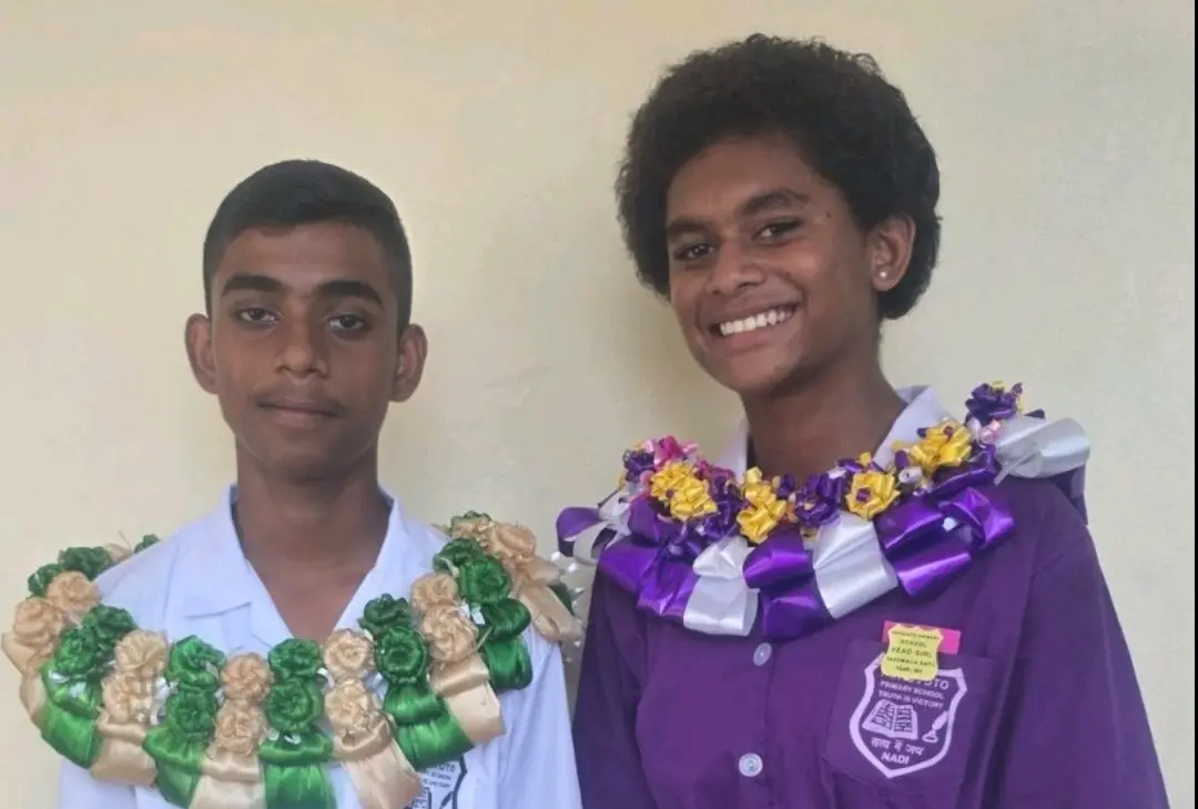 Korovuto Primary School head boy Ravishal Kumar with head girl Vasemaca Ratu.
