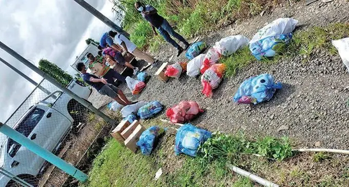 WE-FIJI group distributing food pack at Maravu squatters Nabua on May 26, 2021.