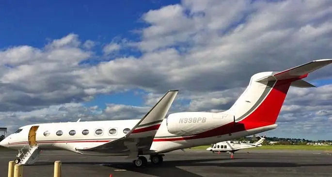 A full view of the Gulfstream private jet with an Aircraft Registration N998PB.