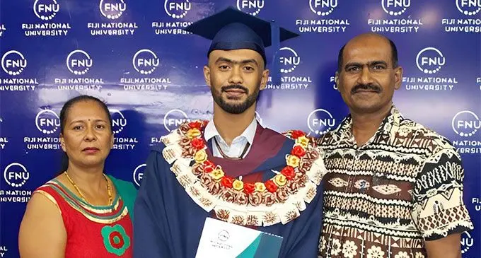 Manish Kumar (middle) with her parents.