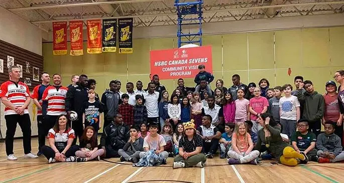 The Fiji Airways Fijian 7s players and officials with students and staff of Mount Pleasant Elementary School in Vancouver on March 4, 2020. Photo: FRU