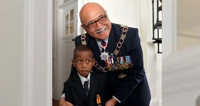 ‘Bravery Medal’ recipeint Aqoriniasi Dreu, 5, with President Major-General (Ret’d) Jioji Konrote at the State House in Suva.  Photo: Ronald Kumar