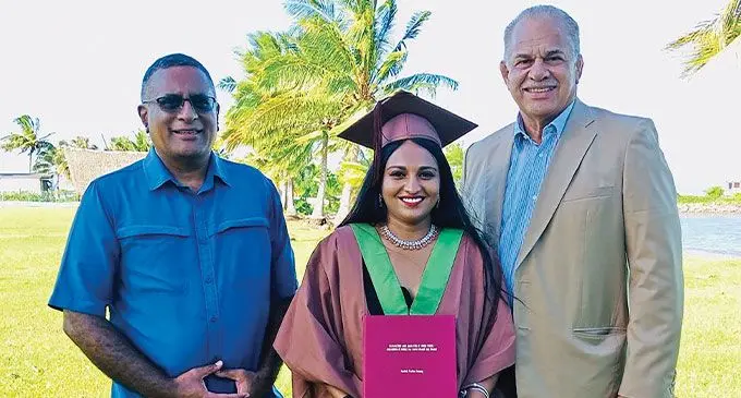 Azekah Swammy flanked by Isoa Korovulavula (left) and Kava Korp executive chairman John Sanday.  Ms Swammy thesis of fresh stems and roots of noble Fiji Kava plant cultivars’, studied the various kava extractions mathods available.