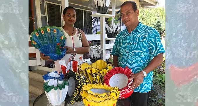 Pirthiraj (right) with his daughter-in-law, Archana Raj, showing the display of handcrafted cement flower pots in Tuatua, Labasa on October 30, 2020. Photo: Shratika Naidu