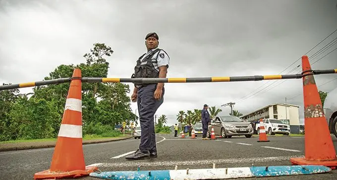 Police mounted a roadblock near the PRB flats at Mead Rd, Nabua, on April 4, 2021.  Photo: Leon Lord