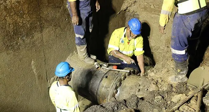 Water Authority of Fiji employees working overtime to fix the pipeline.  Photo: WAF