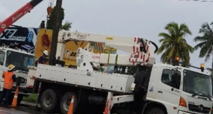 Energy Fiji Limited employees working to fix and restore power supply to affected areas.