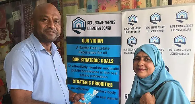 Real Estate Agents Licensing Board Registrar Peni Komainavoka (left) advising Jamila Hanif on the services during the roadshow in Labasa Town on April 28, 2022. Photo: Shratika Naidu