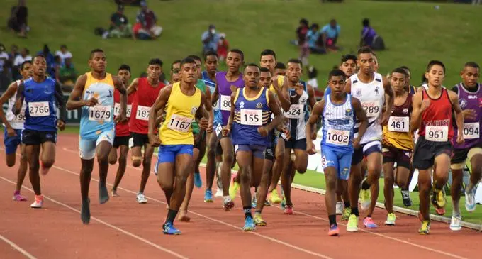 Intermediate Boys 1500 race during the first day of the Coca-Cola Games at ANZ Stadium on April 19, 2018. Photo: Ronald Kumar
