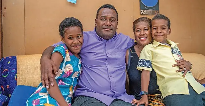 Opposition MP Aliki Bia with his wife, Masilina and children Lusiana, 12 and Maika, 8 at their home in Newtown on March 5, 2023. Photo: Leon Lord