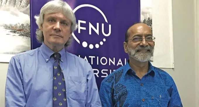 Fiji National University Vice Chancellor Nigel Healey with the new Chancellor and Chair of the Council Rajesh Chandra. Photo: Selita Bolanavanua.