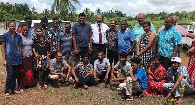 Minister for Rural and Maritime Development and Disaster Management Sakiasi Ditoka (middle) with his staff and residents of Vunivaceva in Tabia, Labasa on January 5, 2023. Photo: Shratika Naidu