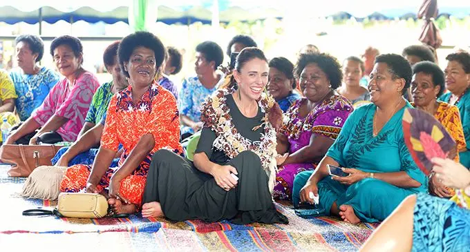 New Zealand Prime Minister Jacinda Ardern with women from Tamavua-i-Wai Village dring her visit on February 26, 2020. Photo: Ronald Kumar