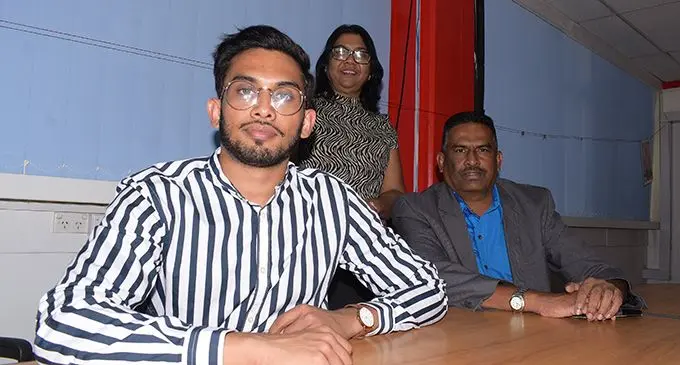 From left, Nilendra Krishna Nair, Sabita Nair and Itendra Nair.