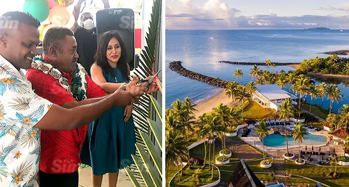 Navua businesswoman, Aswhini Prasad, with her husband, Sanjeev and Tui Namosi Ratu Suliano Matanitobua (centre) cut the ribbon to mark the official the launch of Sanjeev’s Service Station in Navua, on December 24, 2021. Photo: Frederica Elbourne. On the right is the Pearl South Pacific Resort in Pacific HArbour.